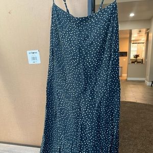 blue romper with white polka dots (has shorts)